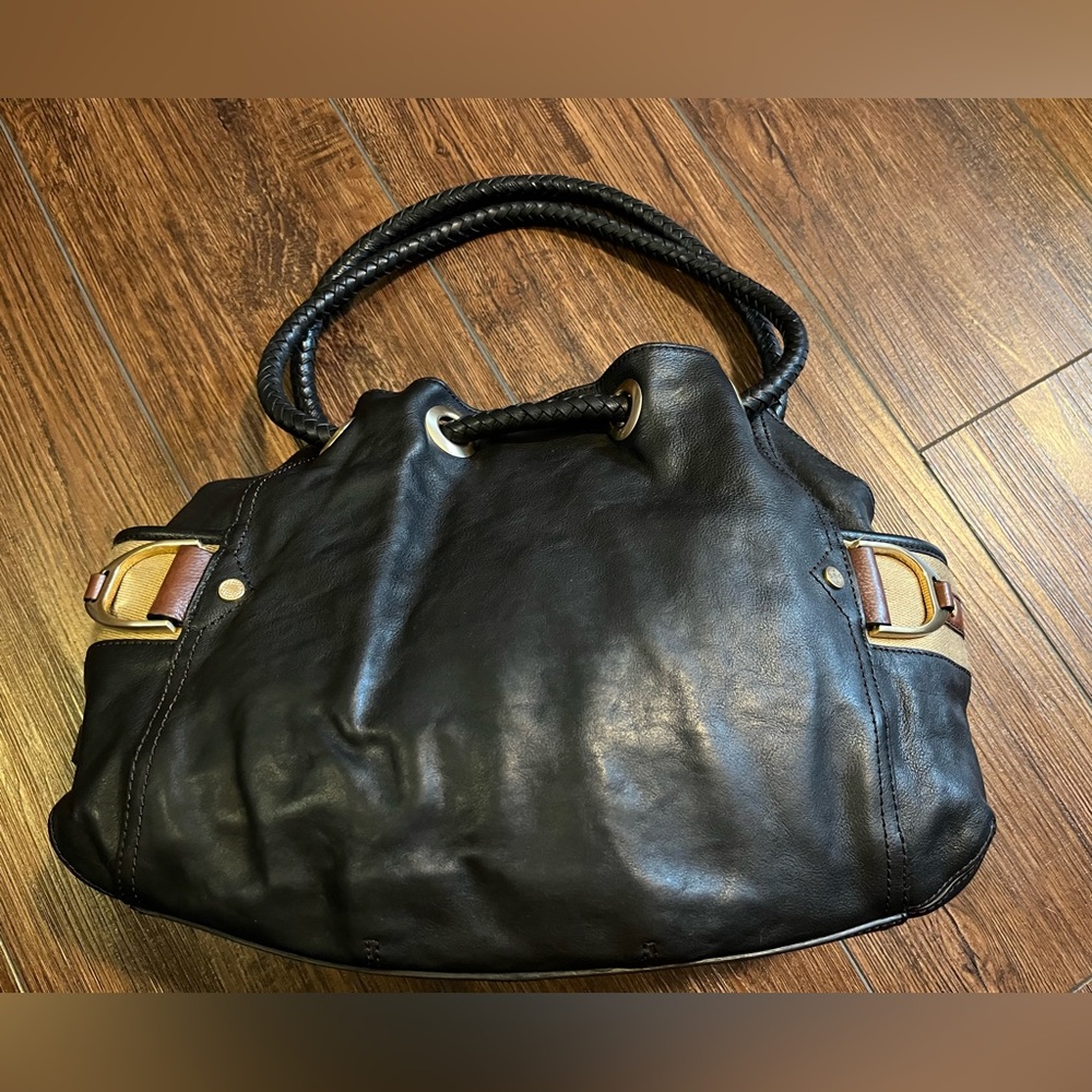 Cole Haan black chestnut spectator saddle unit leather bag.  With original tag.